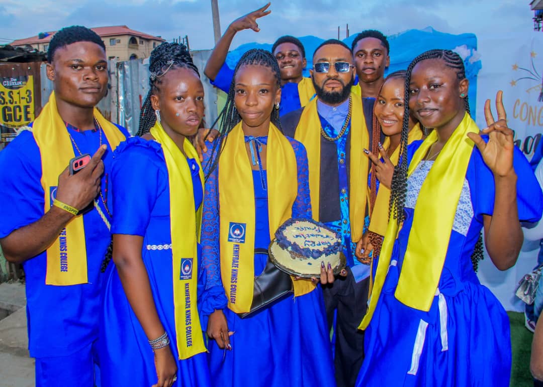 Graduating cohort of Kenifraze Kings College with the School Principal